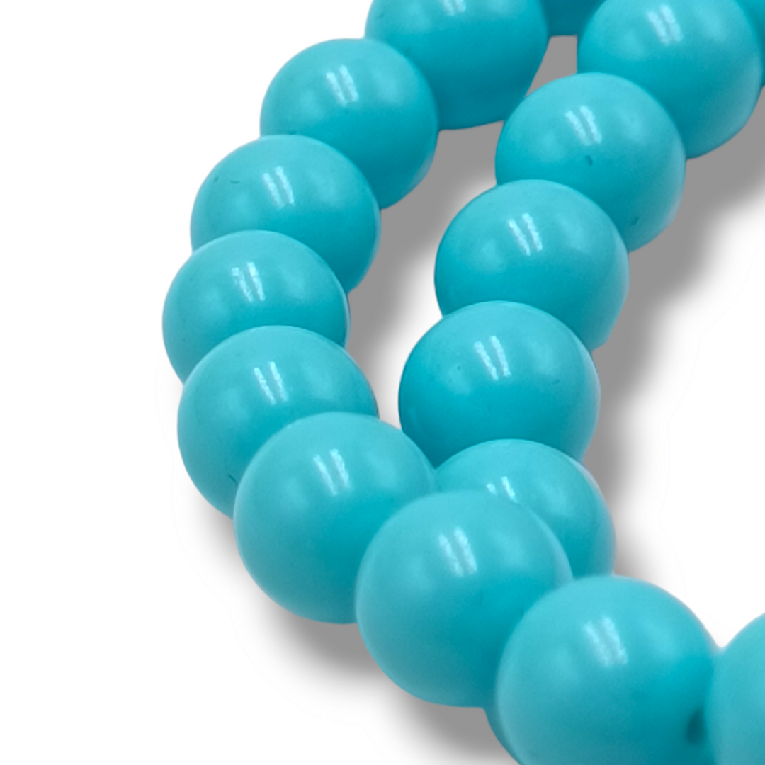 Bracciale fiori in cammeo montati su pasta turchese