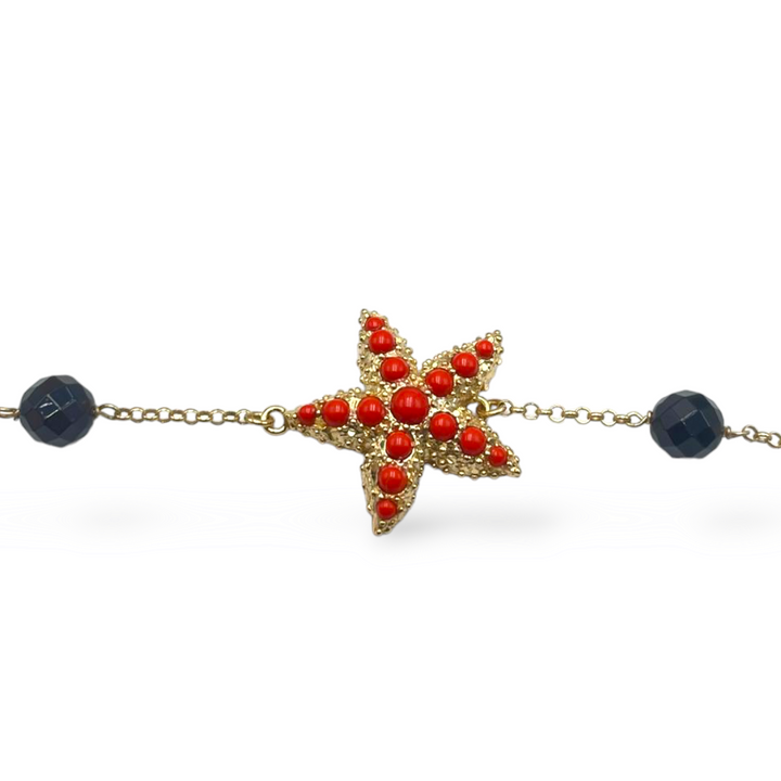 Bracciale stella in corallo montato su argento