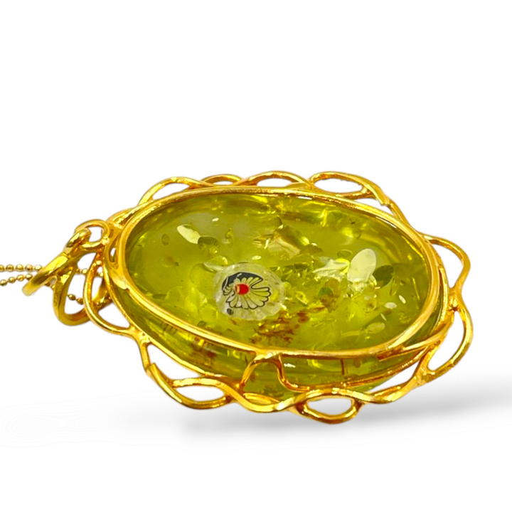 Ciondolo in ambra verde montato su argento