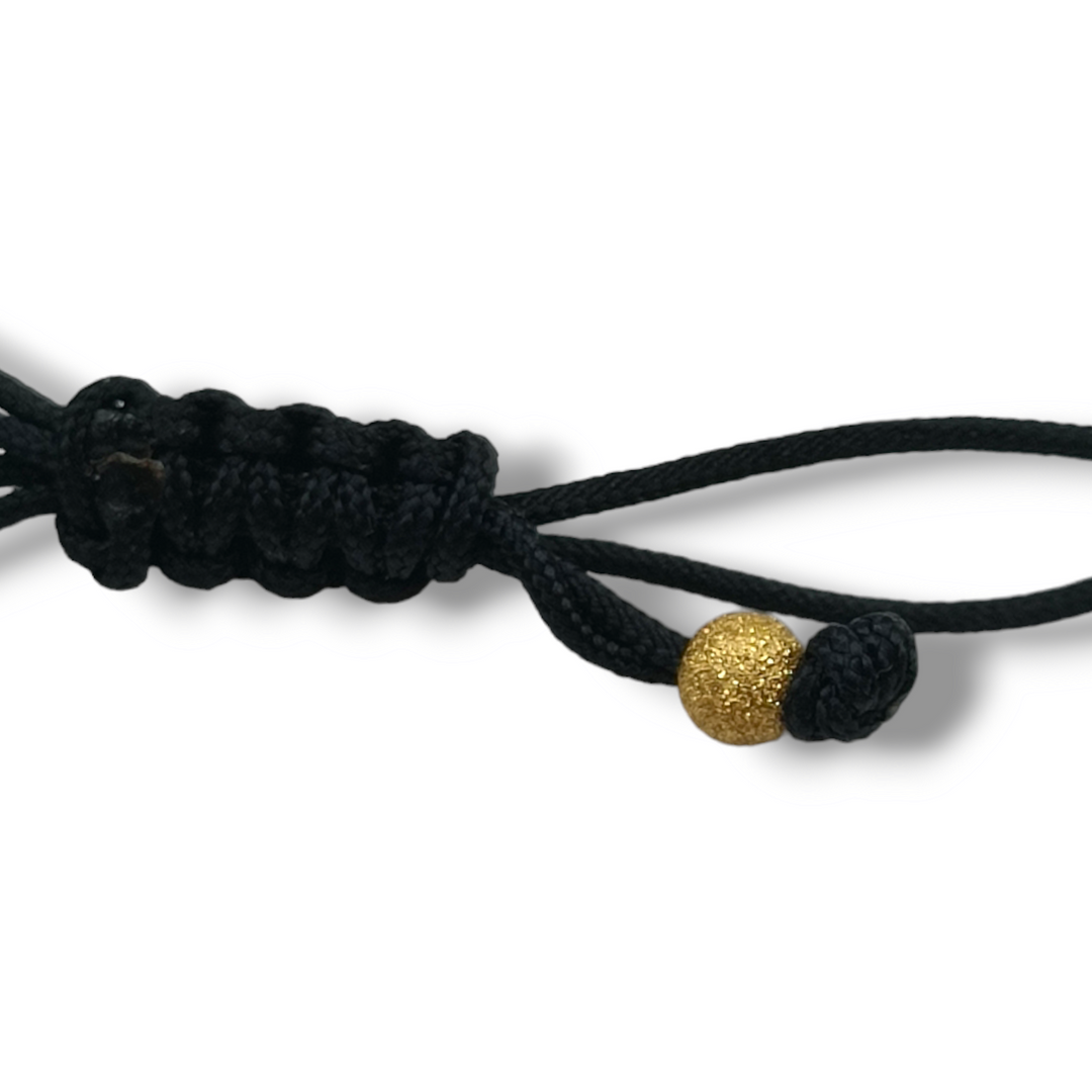 END OF COLLECTION - Bracelet with spheres in gold-plated satin silver mounted on rubber