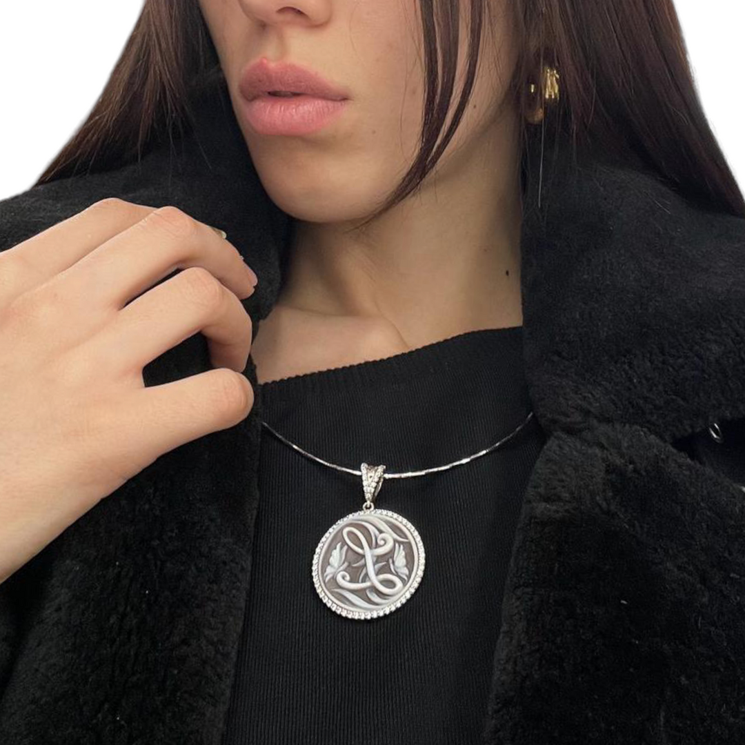 Cameo letter pendant necklace mounted on silver