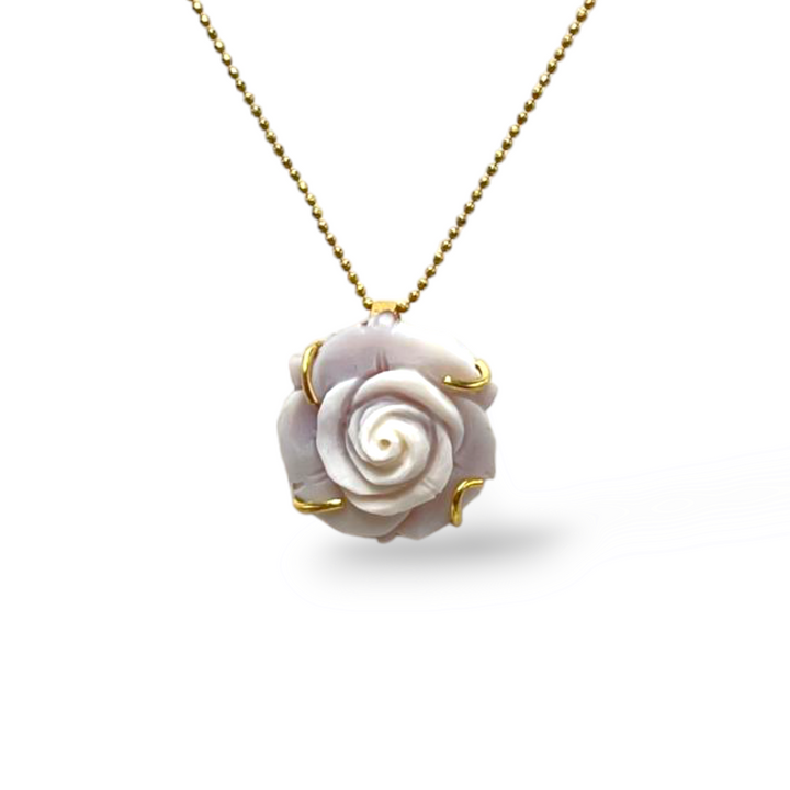 Pink cameo pendant mounted on silver