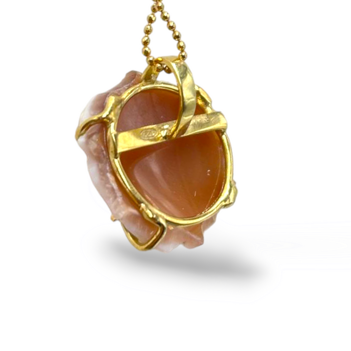 Pink cameo pendant mounted on silver