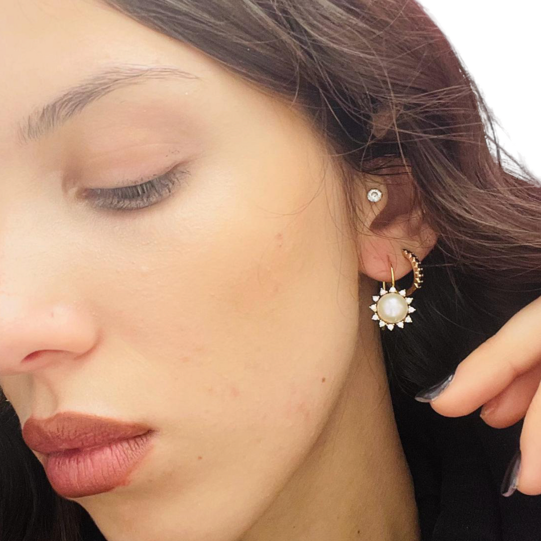 Sun earrings on pearls