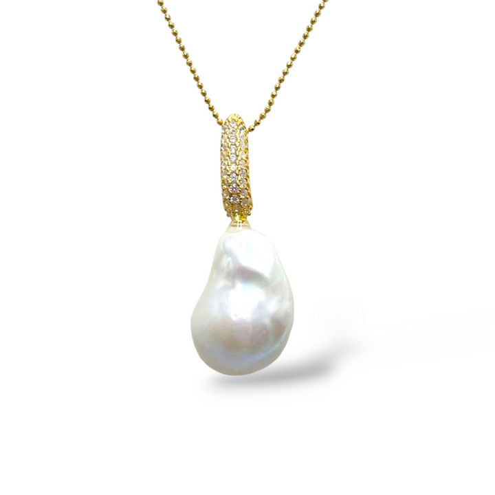 FINE COLLEZIONE - Ciondolo in  perla barocca montato in argento