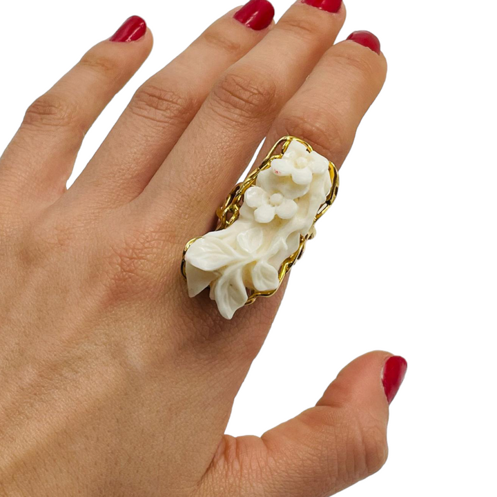 White coral flower ring mounted on silver