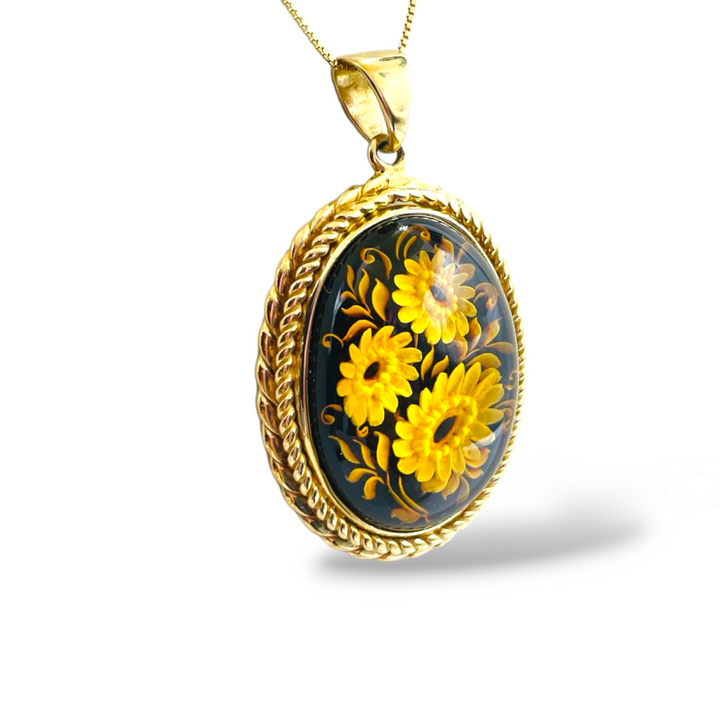 Ciondolo fiori in ambra montato su argento