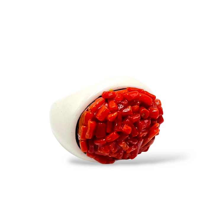 Coral ring mounted on white agate