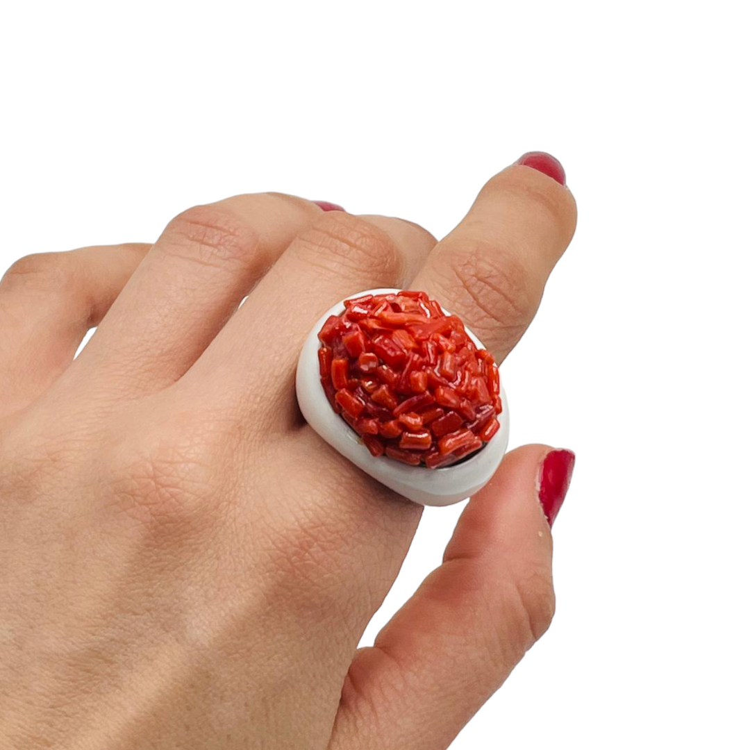 Coral ring mounted on white agate
