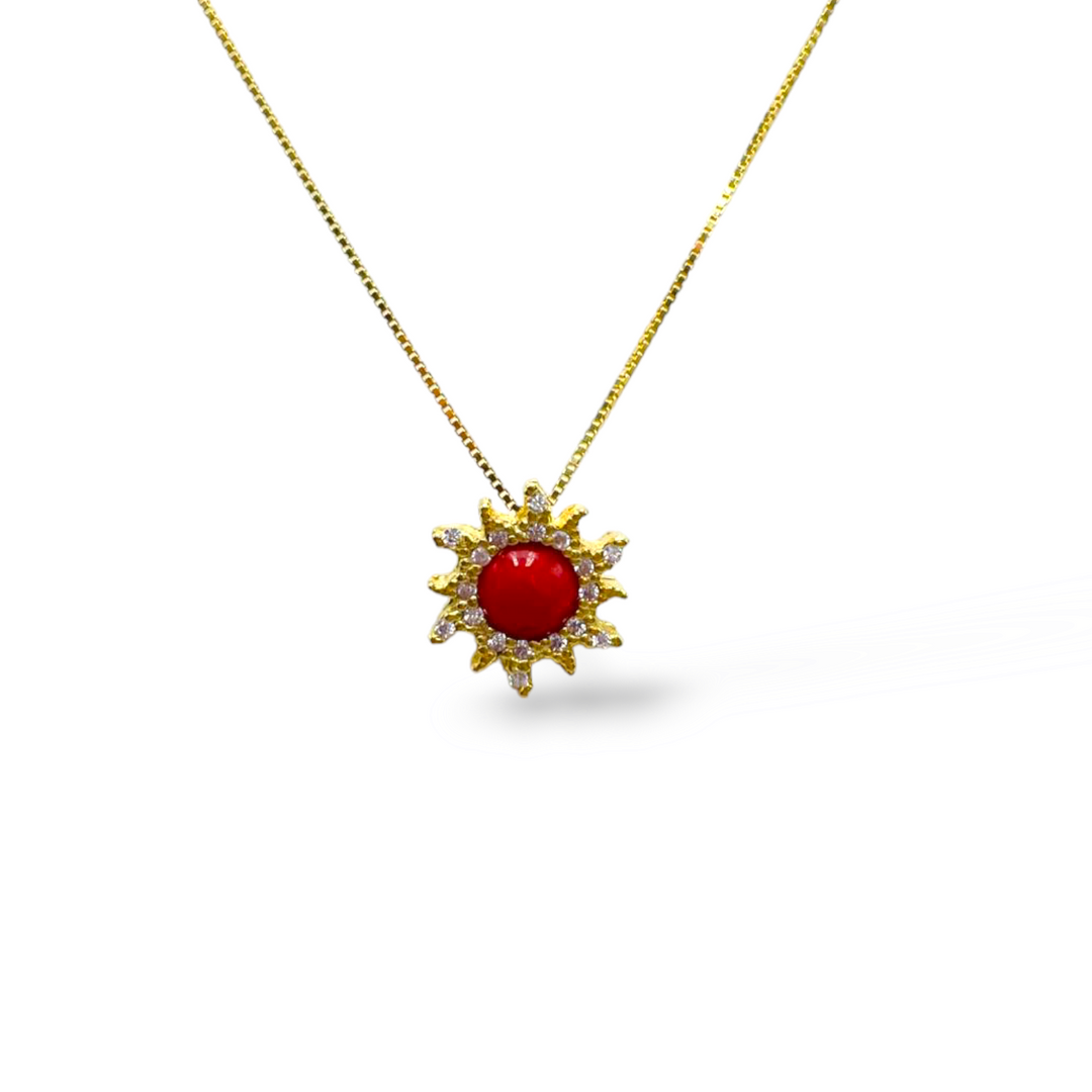 Ciondolo sole in corallo montato su argento