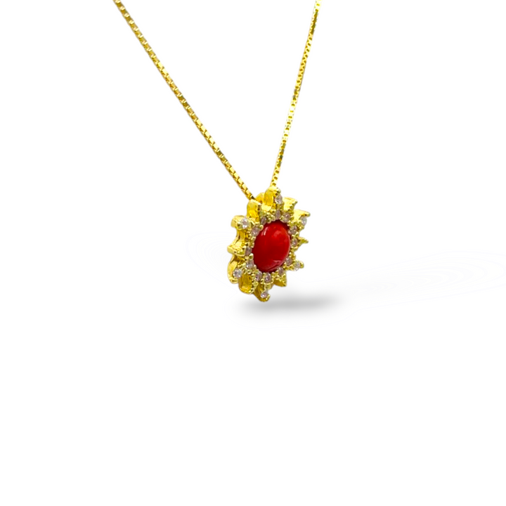 Ciondolo sole in corallo montato su argento