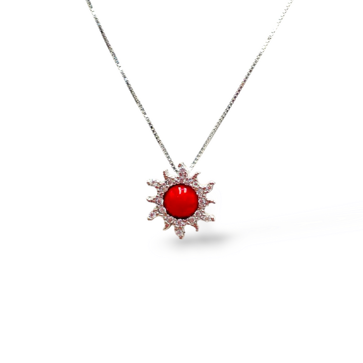 Ciondolo sole in corallo montato su argento