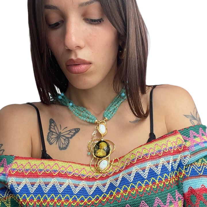 Ciondolo Aisha in ambra blu montato su argento
