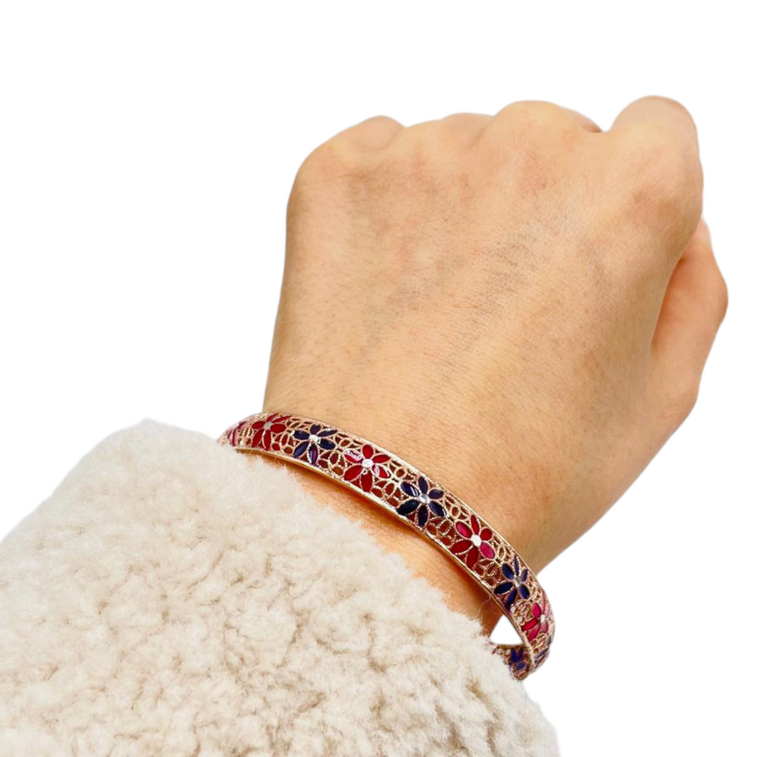 Bracelet flowers in enameled silver with filigree workmanship.