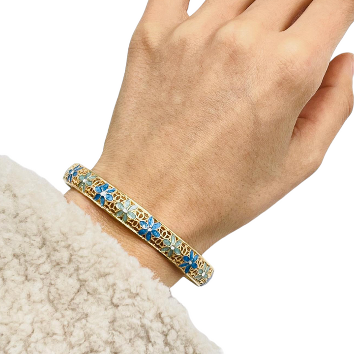 Bracelet flowers in enameled silver with filigree workmanship.