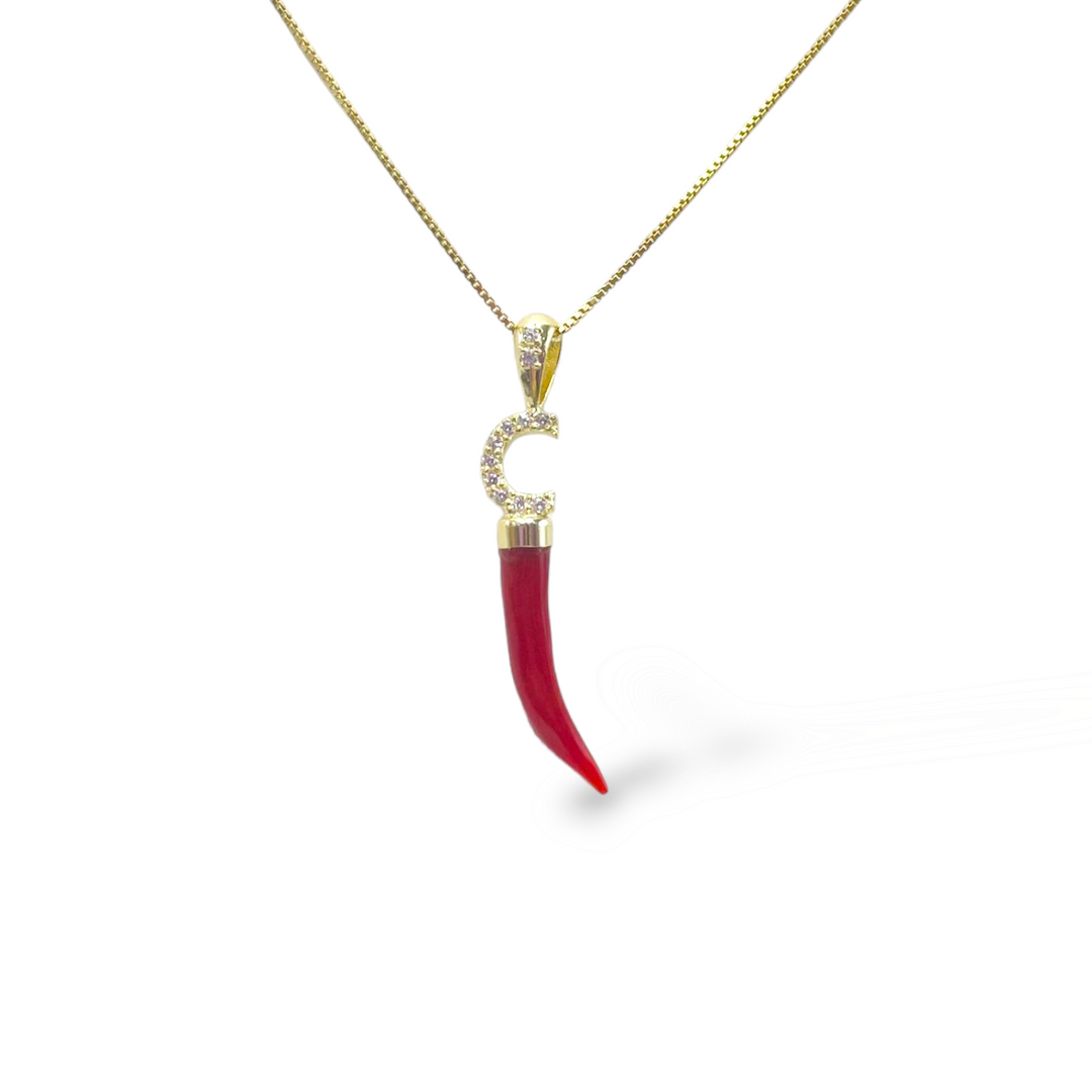 Real coral horn pendant mounted with silver and zirconia letter