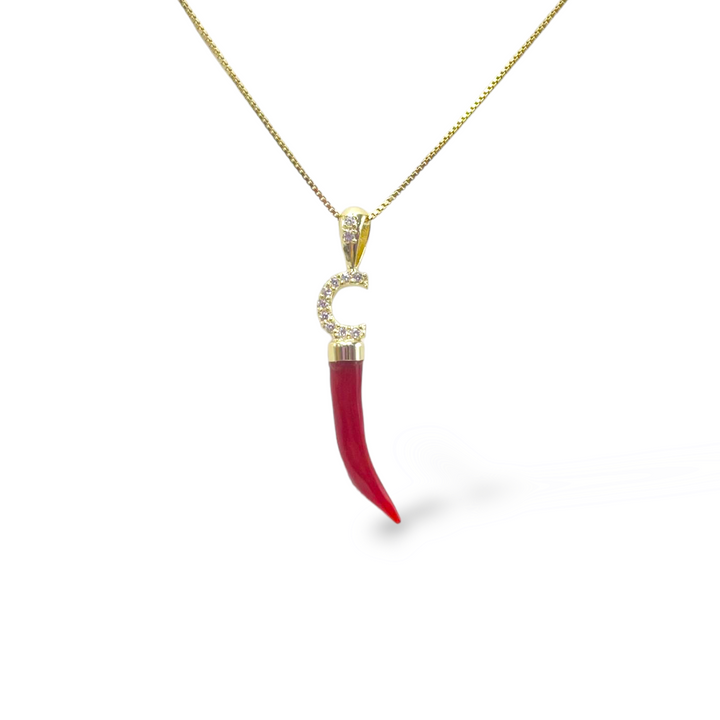 Real coral horn pendant mounted with silver and zirconia letter