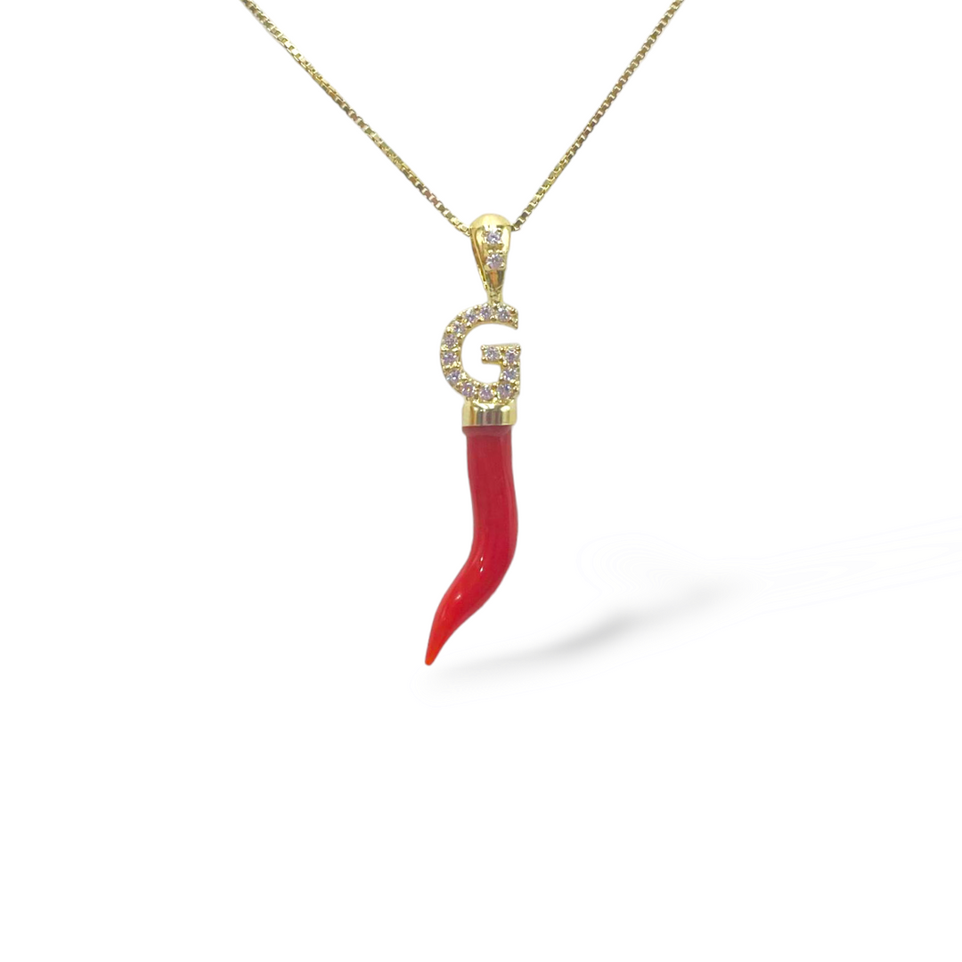 Real coral horn pendant mounted with silver and zirconia letter