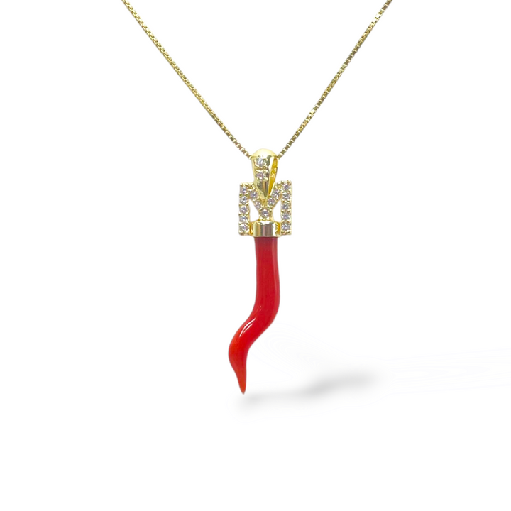 Real coral horn pendant mounted with silver and zirconia letter