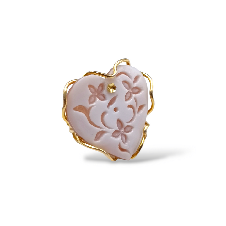 Cameo heart ring mounted on silver