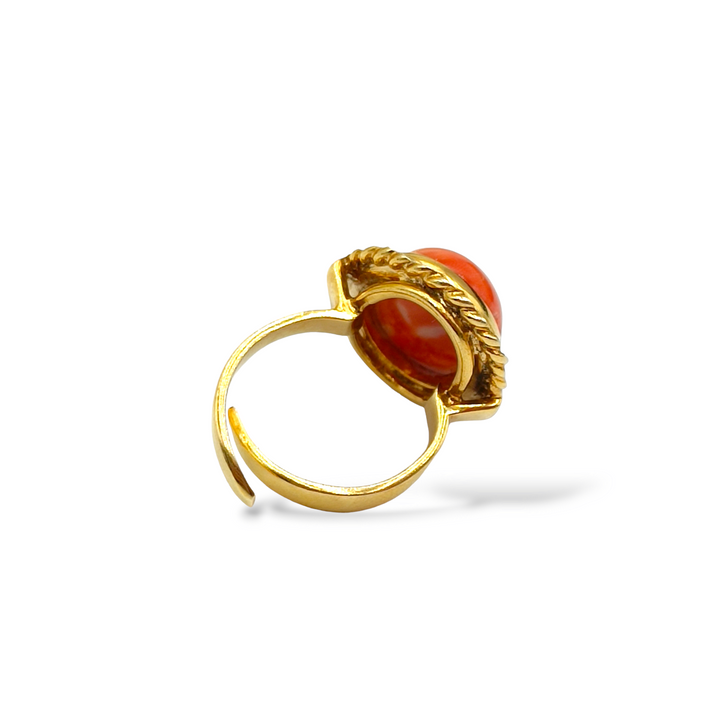Band ring on red coral