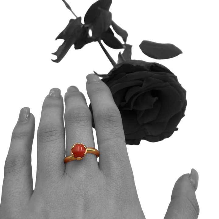 Coral shuttle ring mounted on silver