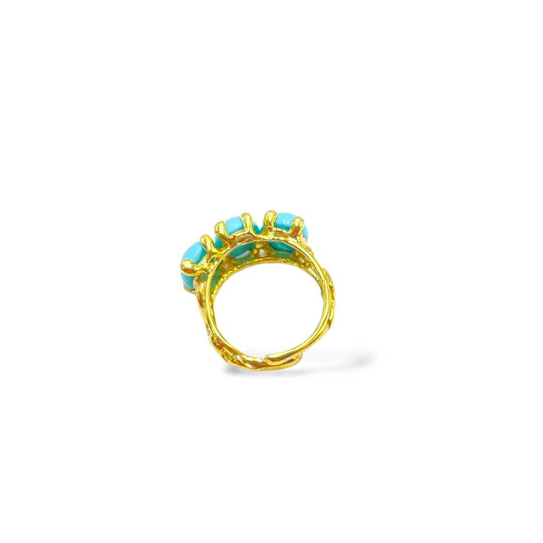 Anello Trilogy in pasta turchese montato su argento