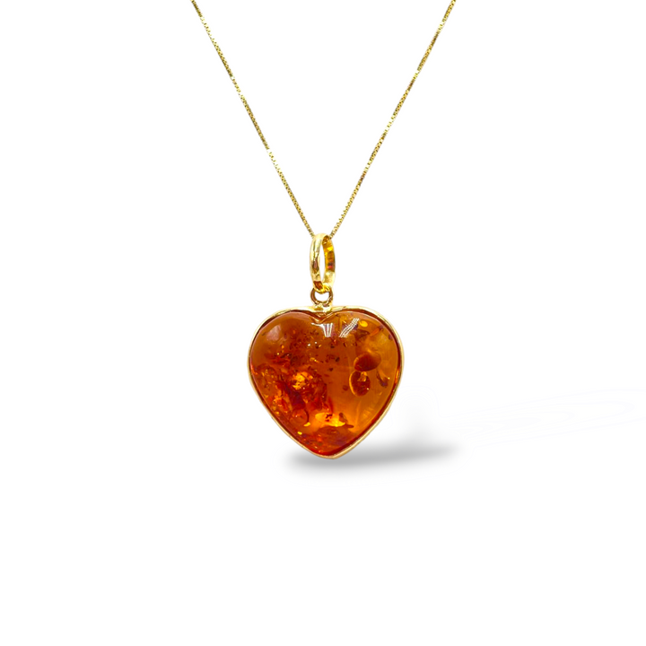 Amber heart pendant necklace mounted on silver