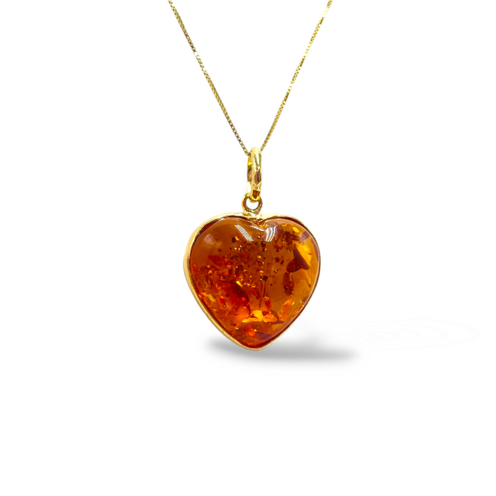 Amber heart pendant necklace mounted on silver