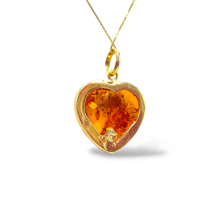 Amber heart pendant necklace mounted on silver