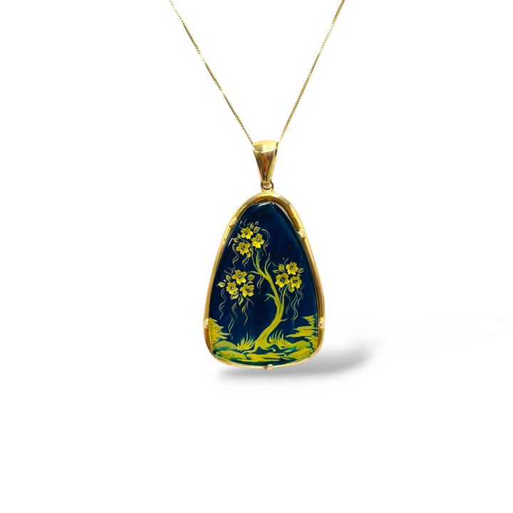 Blue amber tree of life pendant necklace mounted on silver