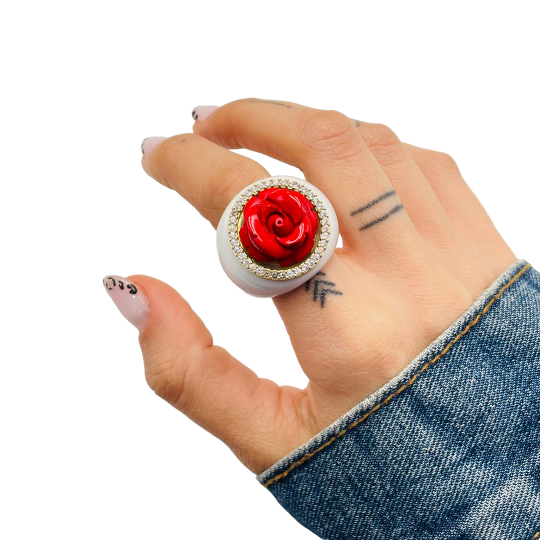 Pink ring in coral paste and mounted on white agate