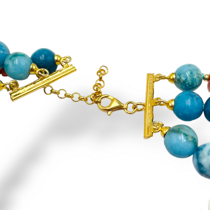 Collana sfere in larimar e corallo montata in argento dorato