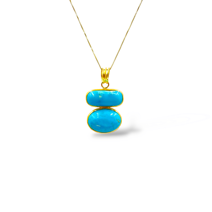 Pendant in real turquoise mounted on silver