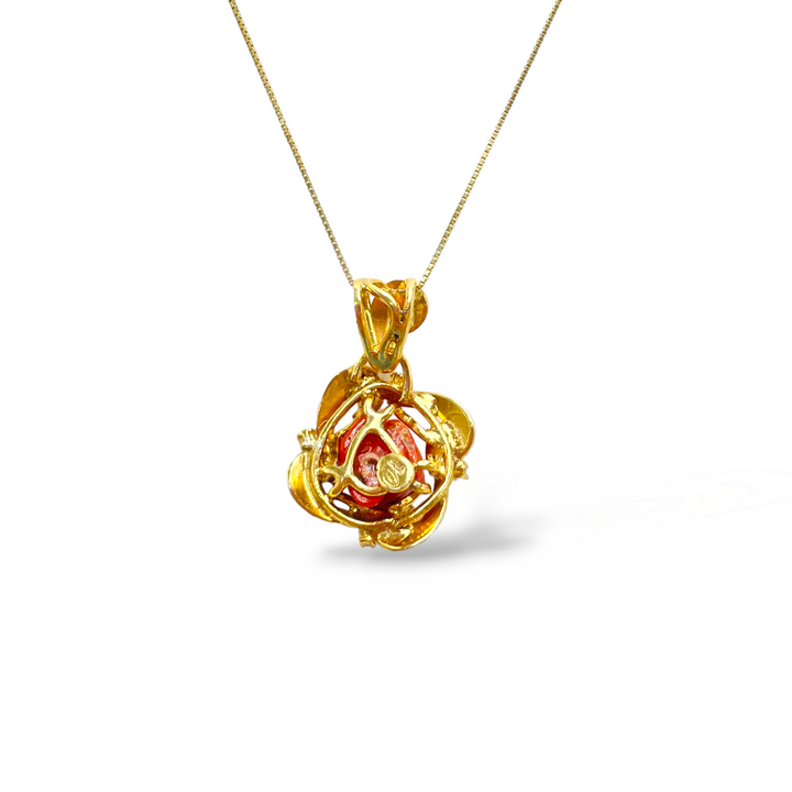 Pink coral pendant necklace set in gold-plated silver