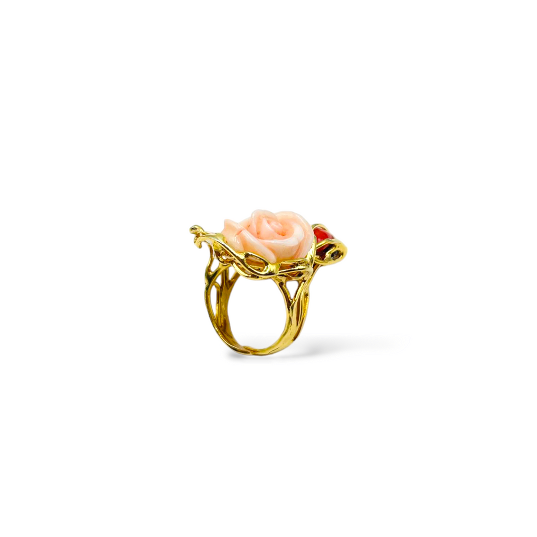 Pink coral stone ring mounted on silver