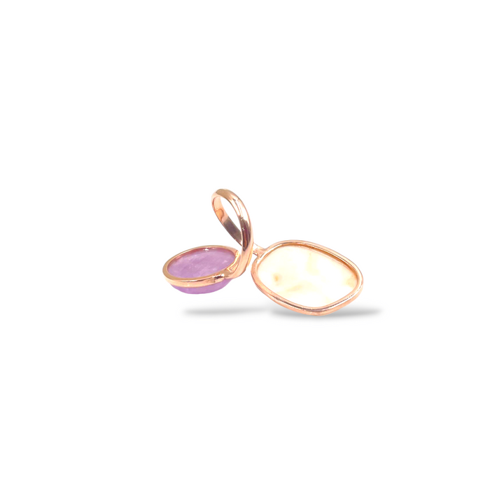 Pink coral and kunzite ring mounted on silver