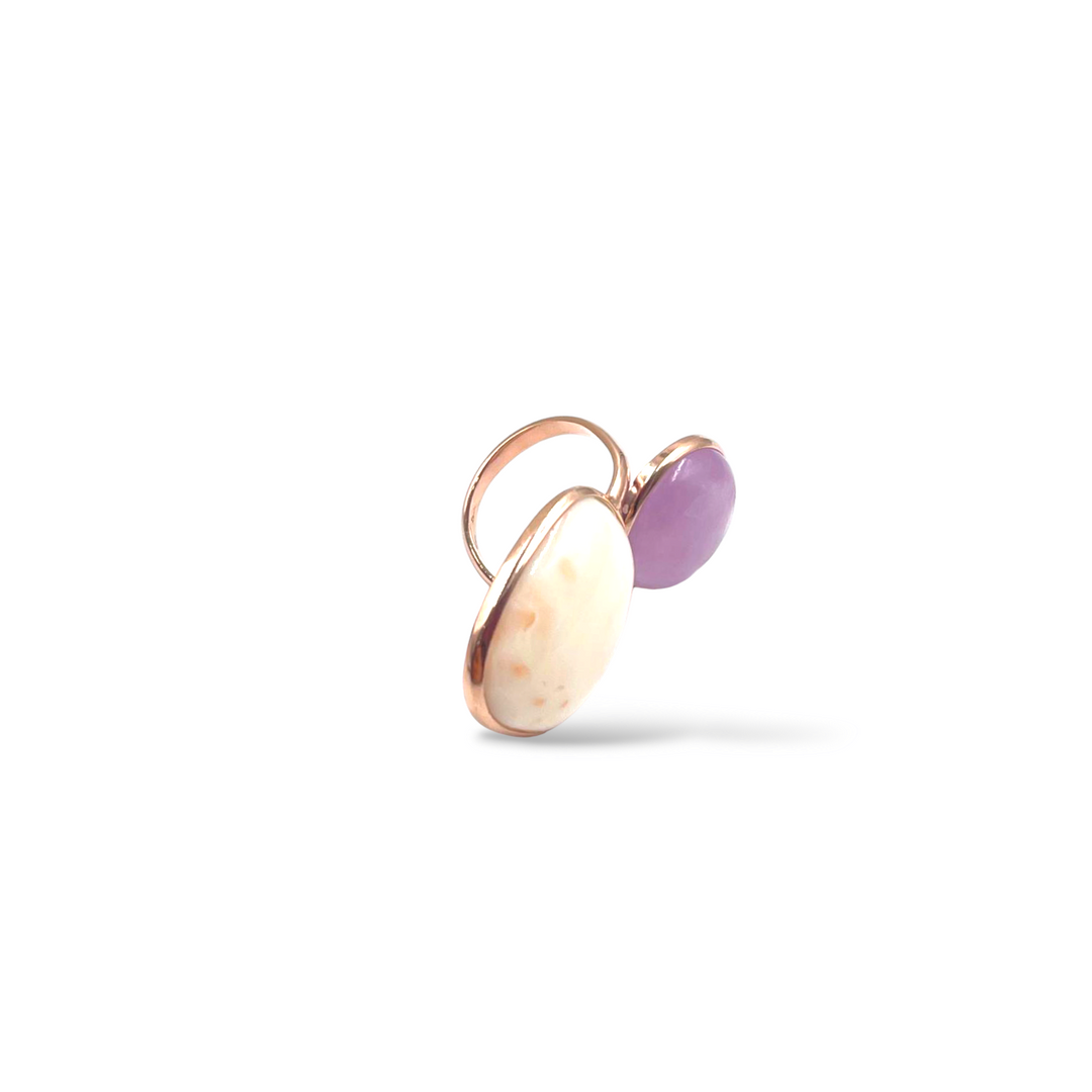 Pink coral and kunzite ring mounted on silver