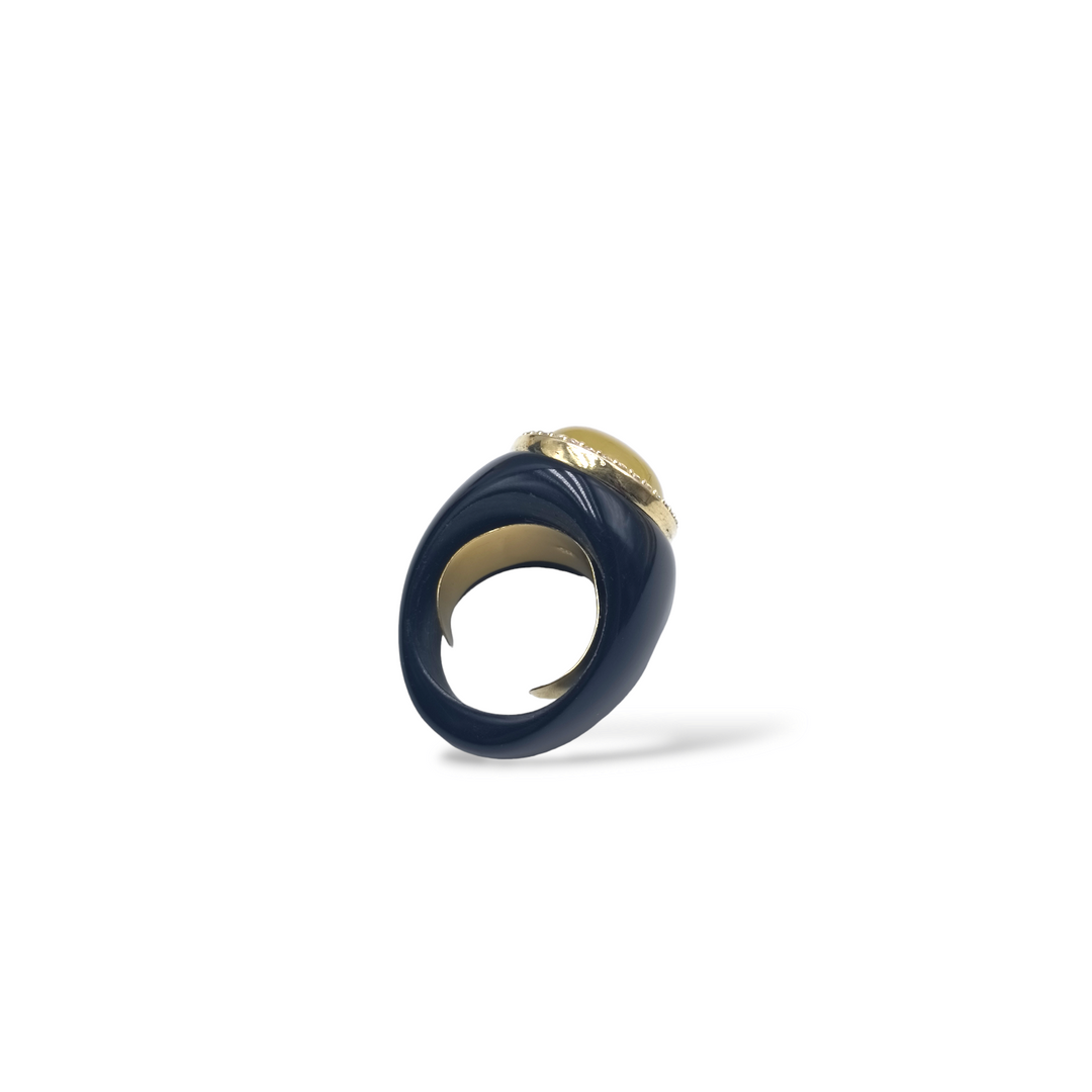 Oval amber ring mounted on silver