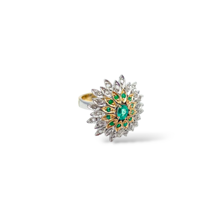 Emerald ring set in gold