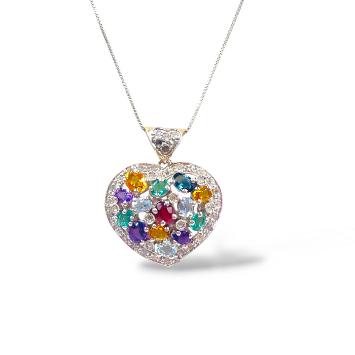 Heart pendant in precious stones mounted on gold