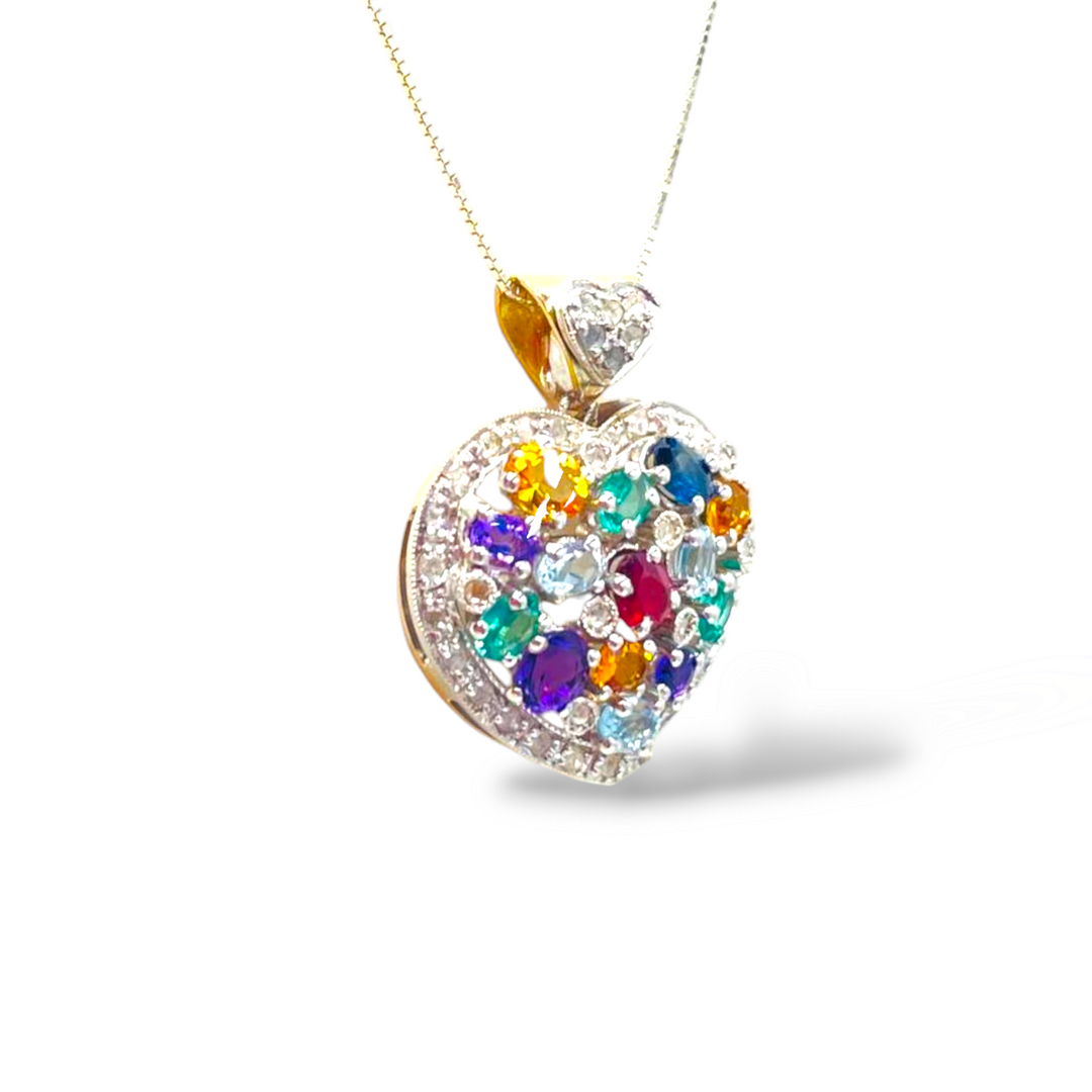 Heart pendant in precious stones mounted on gold
