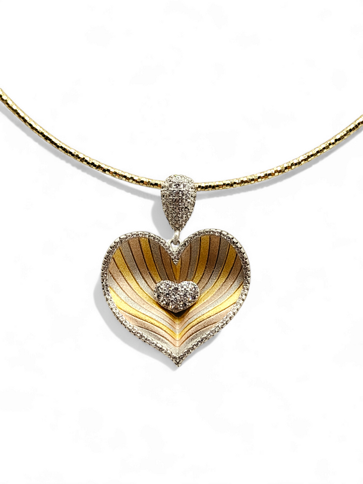 Multi-colored heart pendant necklace mounted on silver
