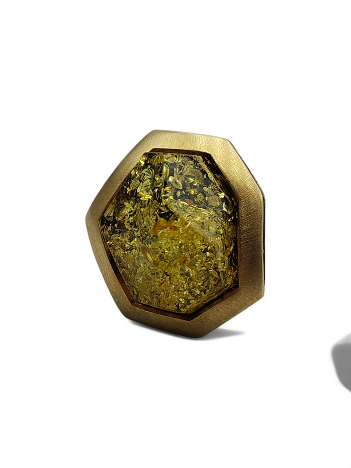 Green and red amber ring mounted on gold plated silver