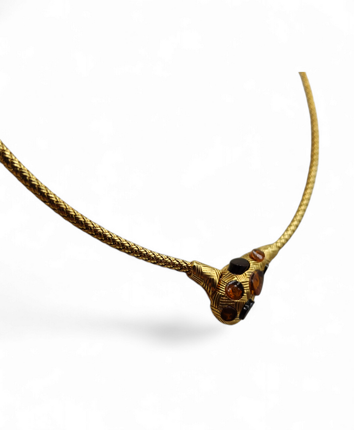 Amber snake rigid necklace mounted on gold plated silver