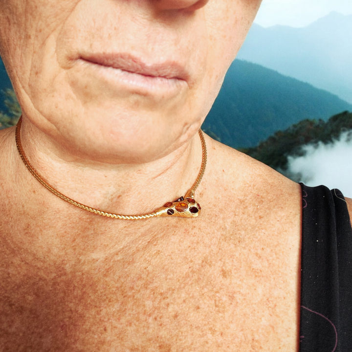 Amber snake rigid necklace mounted on gold plated silver