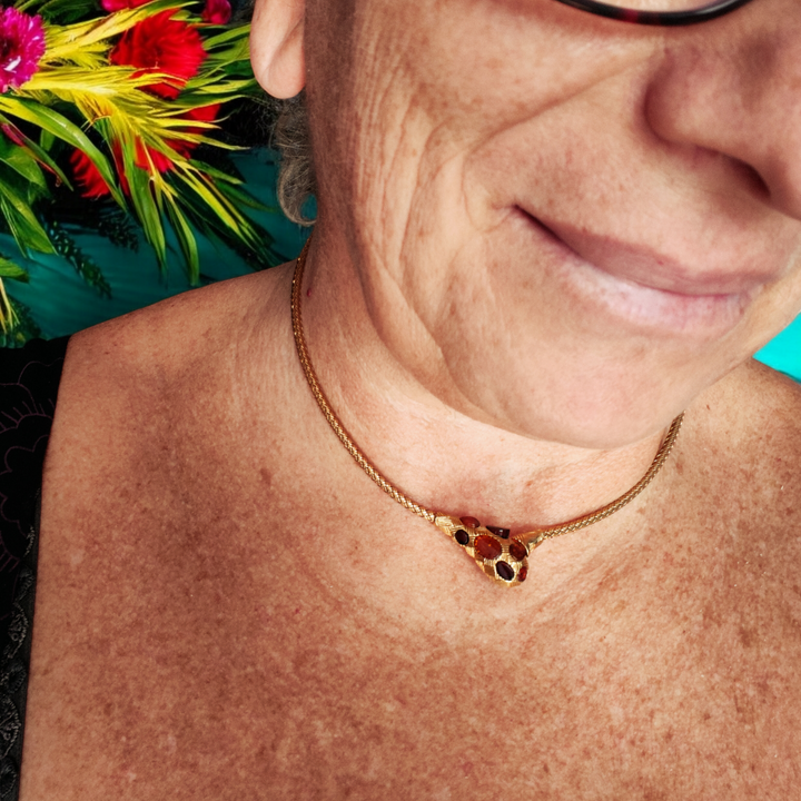 Amber snake rigid necklace mounted on gold plated silver