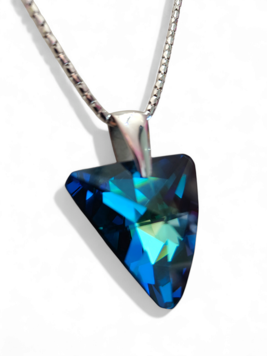 Bohemian blue precious crystal triangle pendant mounted on silver