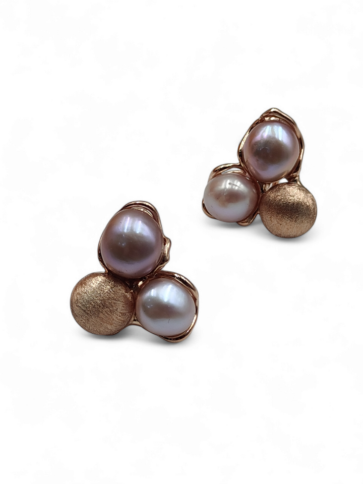 Trilogy pearl earrings mounted on silver