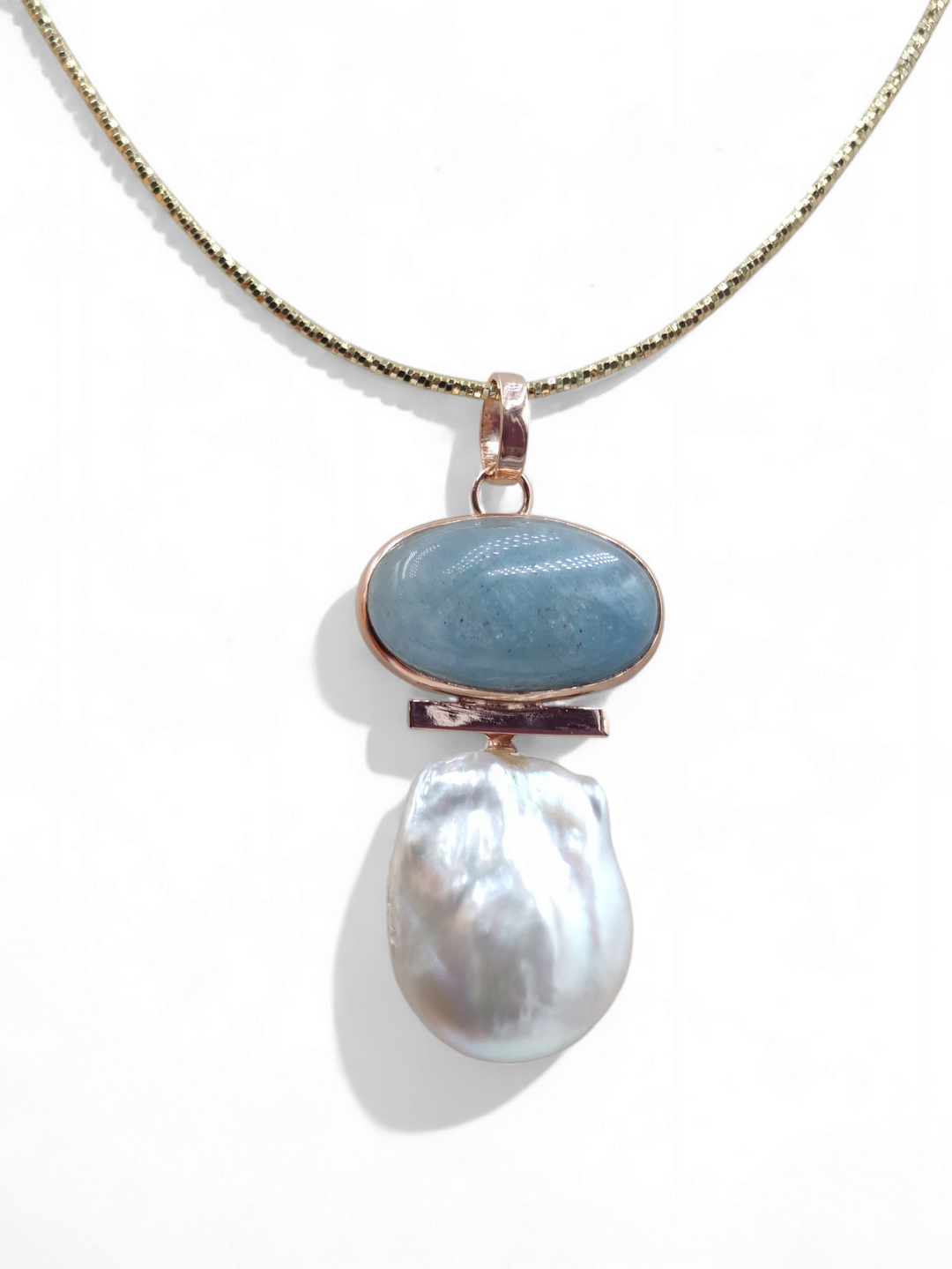 Collana ciondolo in acquamarina e perla scaramazza montato su argento ramato